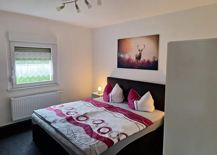 Фото Ferienwohnung Am Wald Lengenfeld 